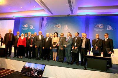 Prime Minister Abdullah Ensour with winners of the Abdul Hameed Shoman Foundation’s Arab Researchers Awards during a ceremony in Amman on Tuesday (Photo courtesy of AHSF)